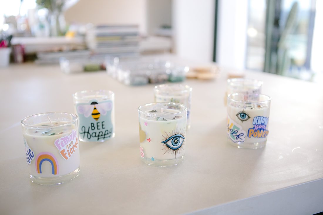 Crystal-infused candles with stickers