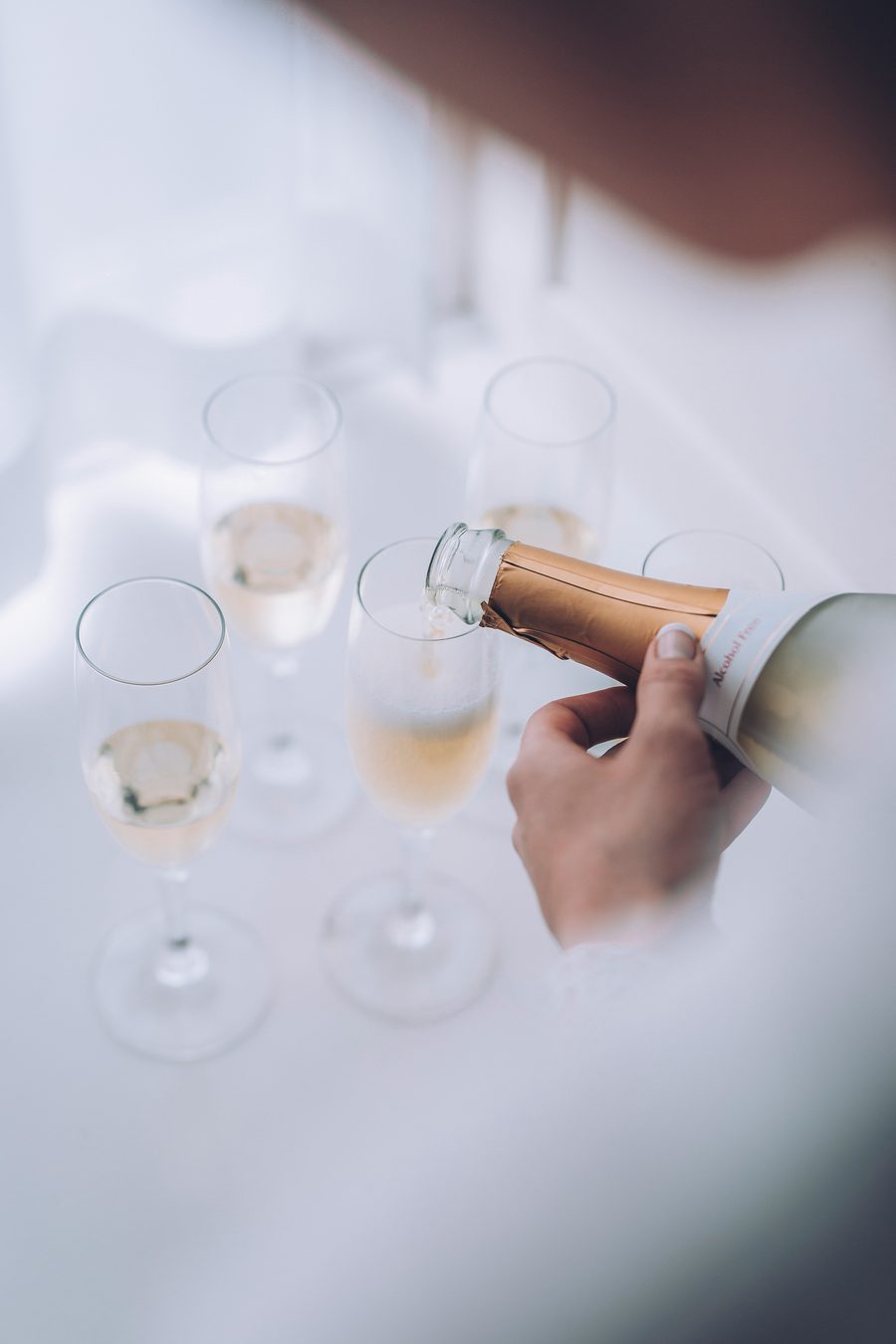 Elegant champagne poured into flutes